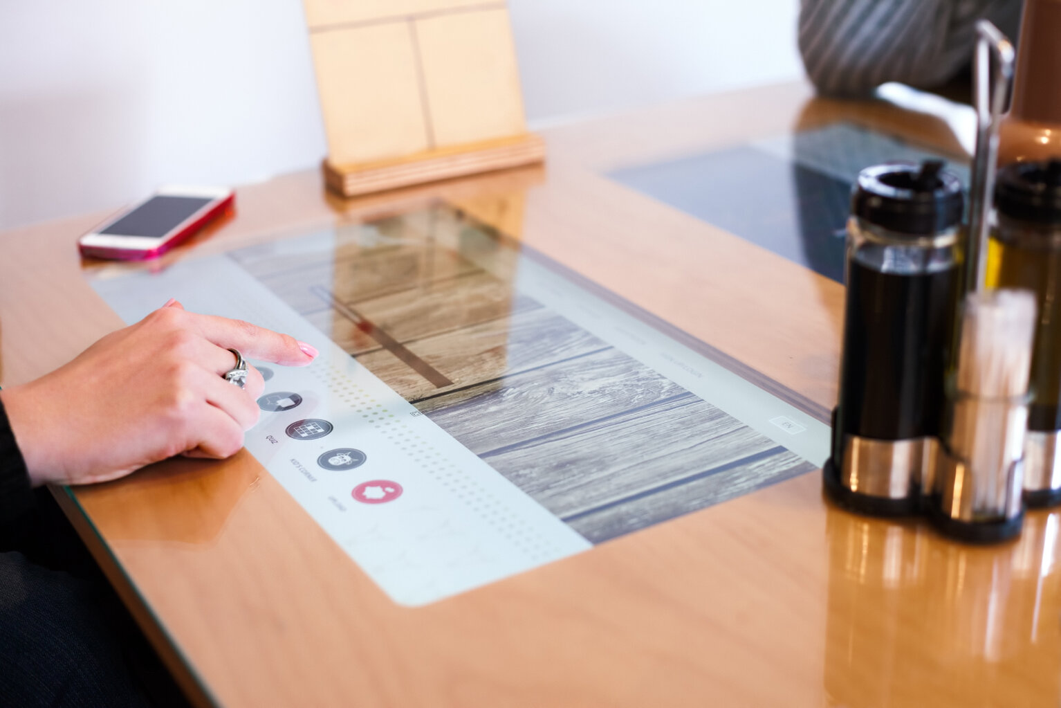 MIKKA Touchscreen All-In-One Monitors are used as digital menus and ordering systems at tables in restaurants (hospitality)